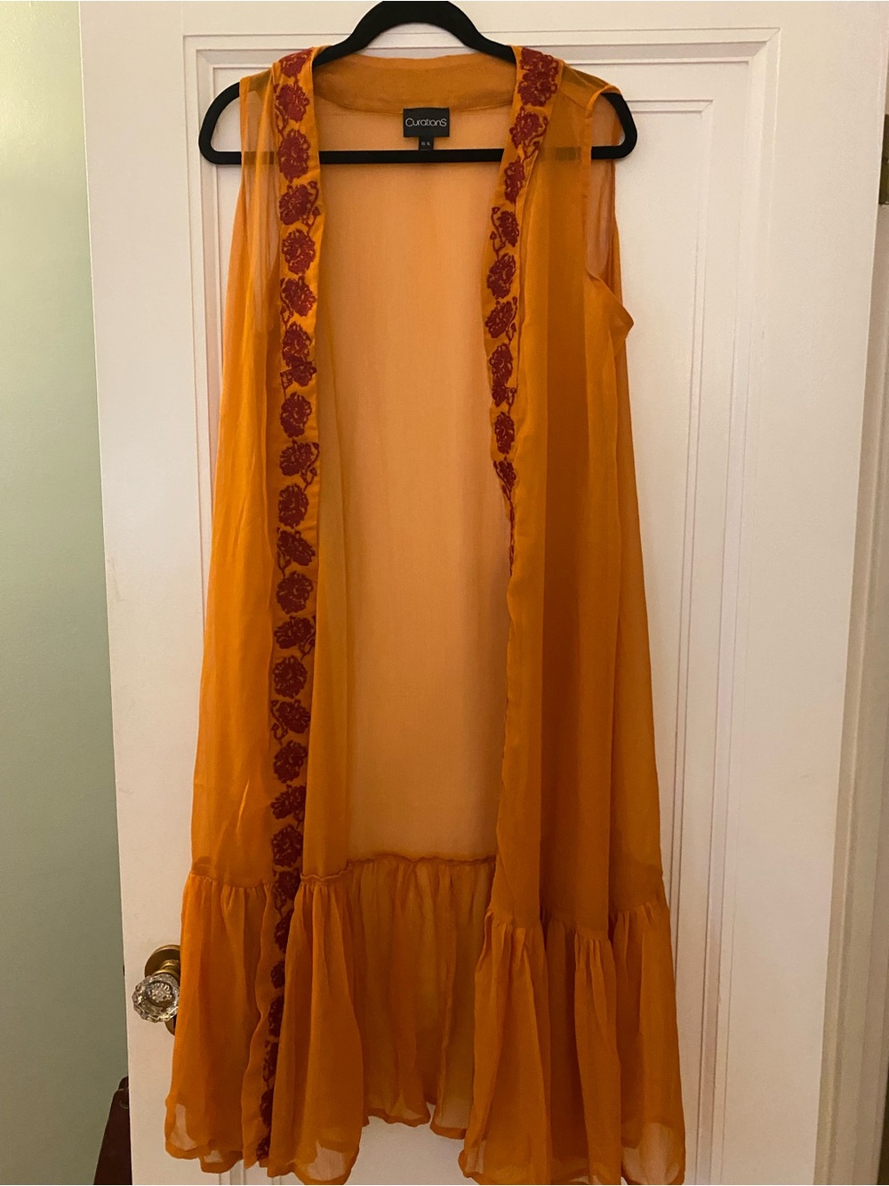 Curations brand long sheer sleeveless cover. Orange with deep red trim